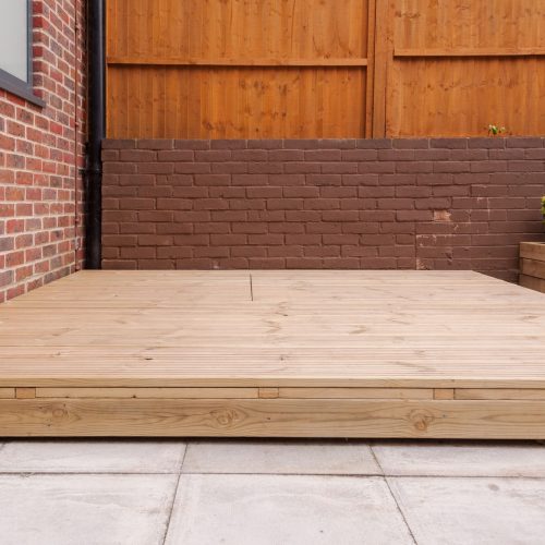 Newly built wooden deck in back garden.